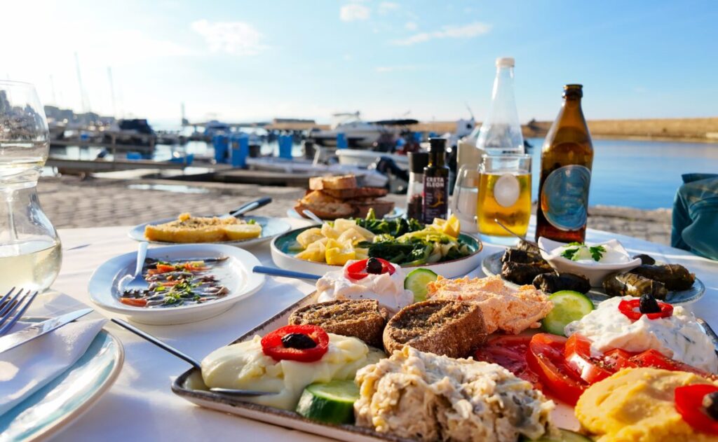 Cretan meze spread by the harbour - authentic food tour experience in Chania